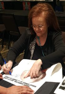 EDIE McCLURG autographs a NATURAL BORN KILLERS Daybill Movie Poster image