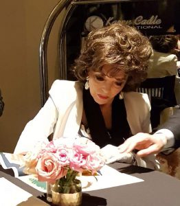 DAME JOAN COLLINS Signing an Australian Daybill Movie Poster image