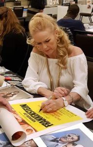 VERONICA CARLSON Signing a HORROR OF FRANKENSTEIN Daybill Movie Poster image